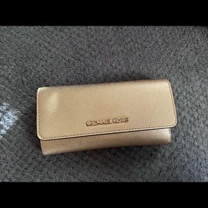 Like new gold Michael Kors Wallet